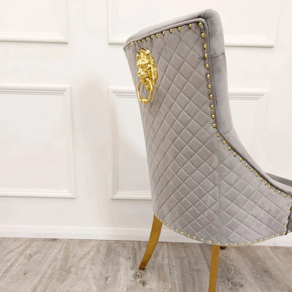 Arianna 180cm Gold Marble Dining Table with Gold Lion Knocker Black Velvet Dining Chairs