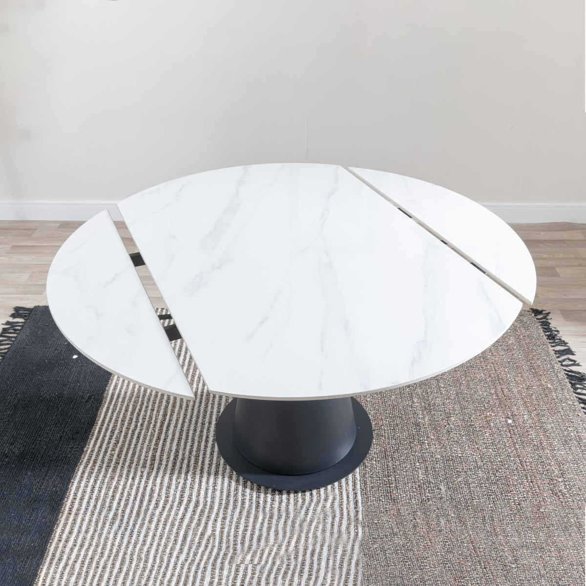 Clara 135cm White Sintered Stone Round Extendable Dining Table - Black Pedestal Base