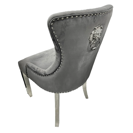 Ariel Black Marble Dining Table with Megan Lion Knocker Plain Back Velvet Dining Chairs